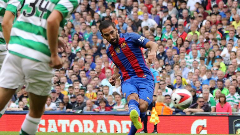 Barcelona's Turkish midfielder Arda Turan scores the opening goal of the pre-season International Champions Cup football match between Spanish champions, B