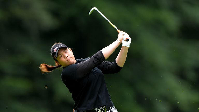  Ariya Jutanugarn of Thailand hits her second shot on the 3rd hole during the final round of the Ricoh Women's British Open