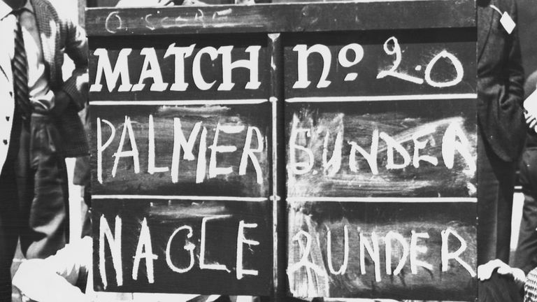 The scoreboard during Match number 20 of the Open Golf Championship at Royal Troon Golf Club, Scotland, July 1962. American champion Arnold Palmer is playi
