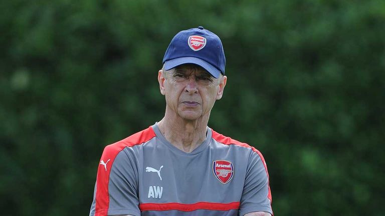 Arsenal manager Arsene Wenger supervises a training session