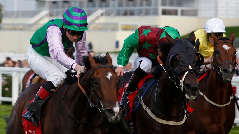 Freddy Tylicki and Arthenus (left) get the better of Robert The Painter to win the Champagne Bollinger Classified Stakes at Ascot in September 2015.