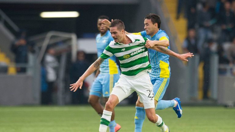 Celtic's Mikael Lustig goes to ground in the penalty box