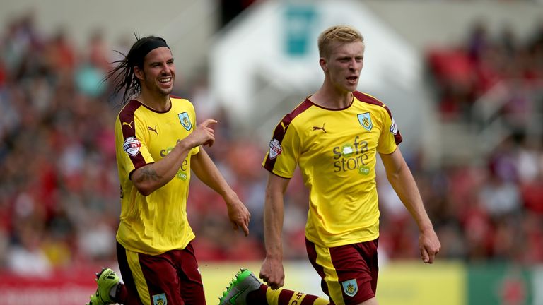 Ben Mee (right) says he feels at home at Burnley