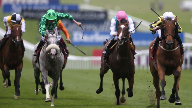 Big Orange (right) holds off all challengers to win the Princess of Wales's Arqana Racing Club Stakes for the second year running.
