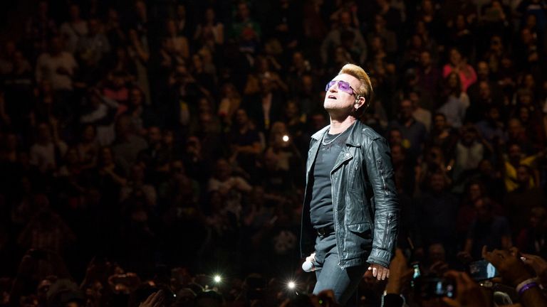 Bono from U2 performing during their Innocence + Experience tour at the O2 arena in Greenwich, London.
