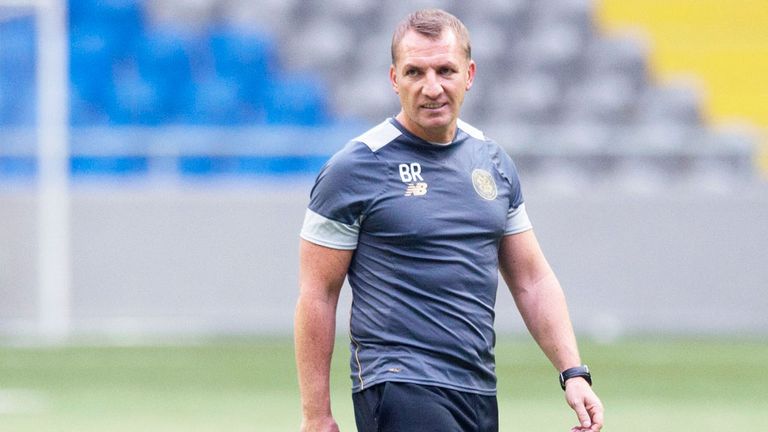 Brendan Rodgers watching his players limber up in Astana