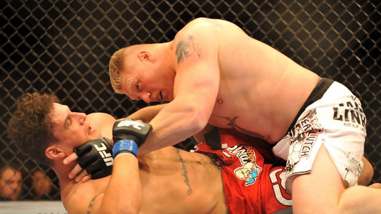 LAS VEGAS - JULY 11:  Brock Lesnar holds down Frank Mir during their heavyweight title bout during UFC 100 on July 11, 2009 in Las Vegas, Nevada.  (Photo b