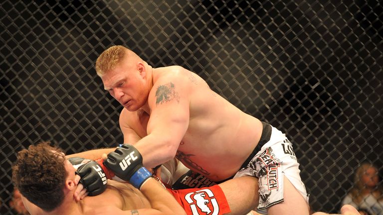 LAS VEGAS - JULY 11:  Brock Lesnar holds down Frank Mir during their heavyweight title bout during UFC 100 on July 11, 2009 in Las Vegas, Nevada. Lesnar de
