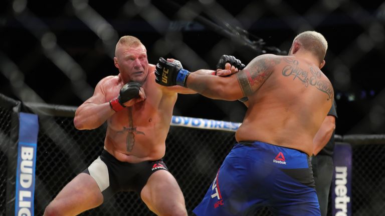 LAS VEGAS, NV - JULY 9: Brock Lesnar punches Mark Hunt (R) during the UFC 200 event at T-Mobile Arena on July 9, 2016 in Las Vegas, Nevada. (Photo by Rey D