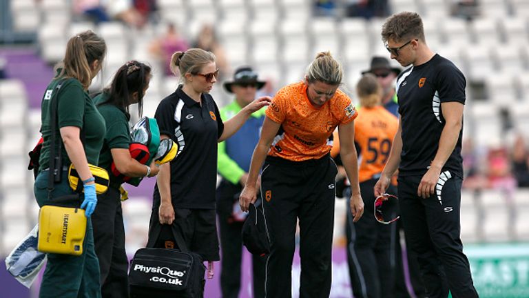 SOUTHAMPTON, ENGLAND - JULY 31: Charlotte Edwards of the Southern Vipers leaves the field after sustaining an injury during the Kia Super League women's cr