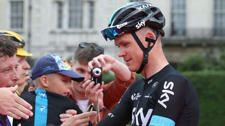 Froome signed autographs for fans at the start line