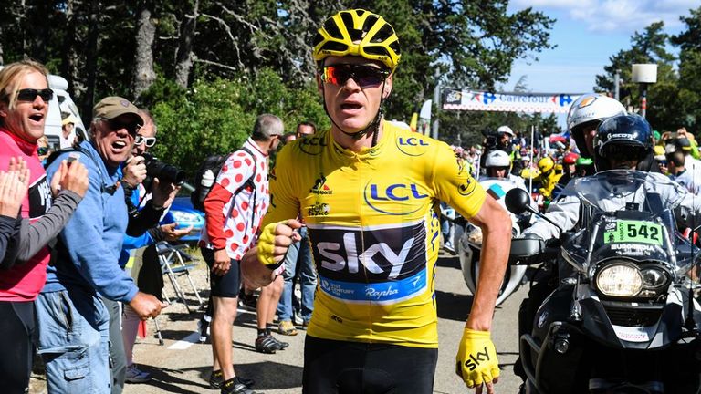 Chris Froome runs up Mont Ventoux after breaking his bike in a crash
