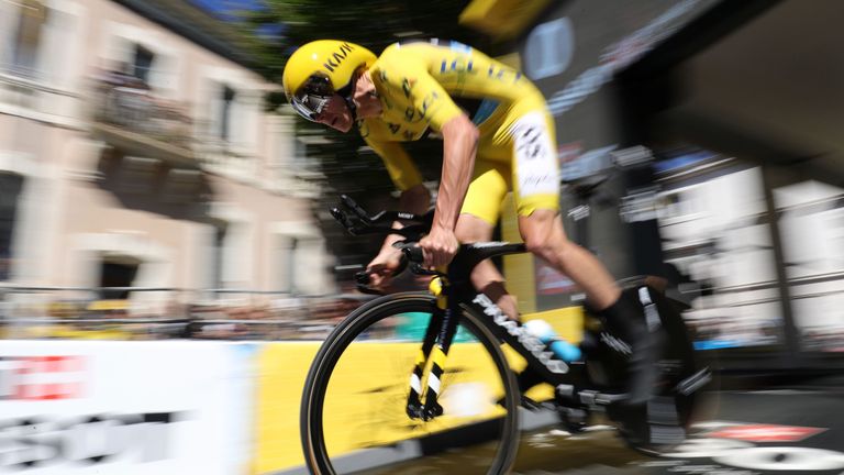 Great Britain's Christopher Froome, wearing the overall leader's yellow jersey, takes the start of the 37,5 km individual time-trial, the thirteenth stage 