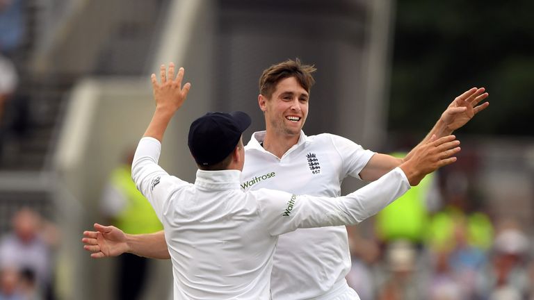 Chris Woakes celebrates with Gary Ballance (l) after dismissing Mohammad Hafeez