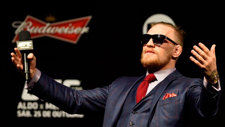 RIO DE JANEIRO, BRAZIL - OCTOBER 24: Conor McGregor of Ireland interacts with fans during a Q&A session before the UFC 179 weigh-in  at Maracanazinho on Oc