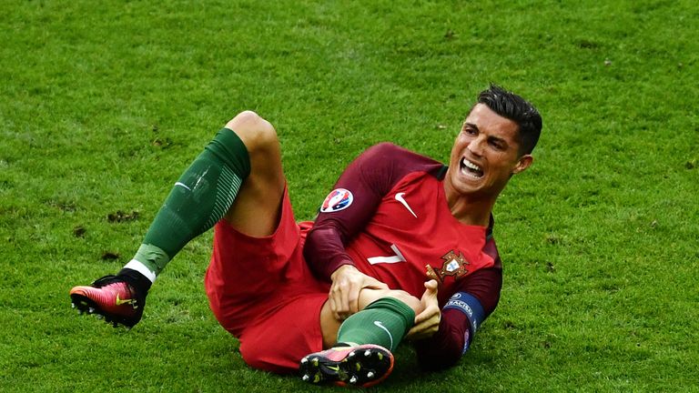 Cristiano Ronaldo of Portugal lies injured