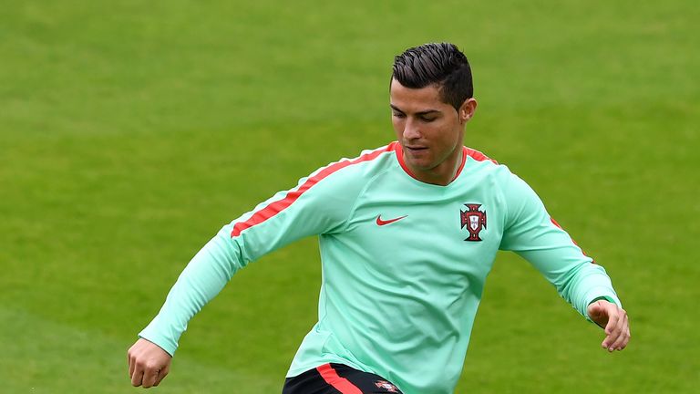 Portugal's forward Cristiano Ronaldo plays the ball during a training session at Portugal's base camp in Marcoussis, outskirts of Paris, on July 5, 2016, a
