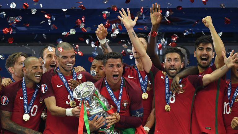 Cristiano Ronaldo of Portugal (c) lifts the European Championship trophy