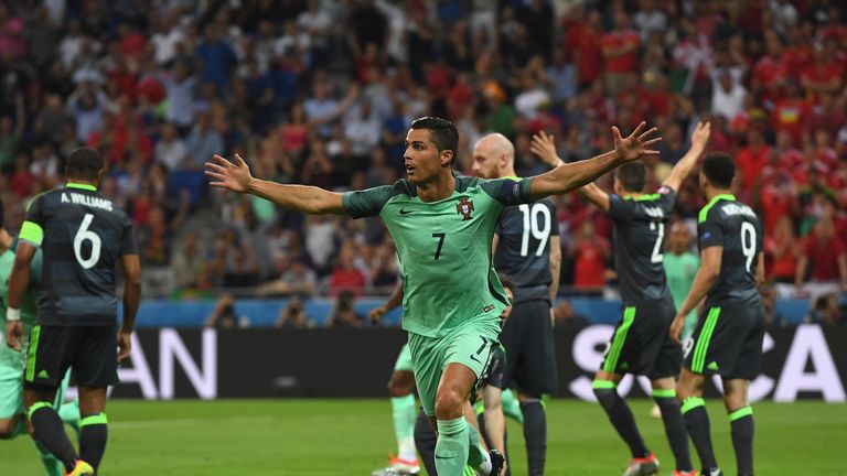 Cristiano Ronaldo of Portugal celebrates scoring the opening goal during the UEFA EURO 2016 semi final match between Portugal and Wales