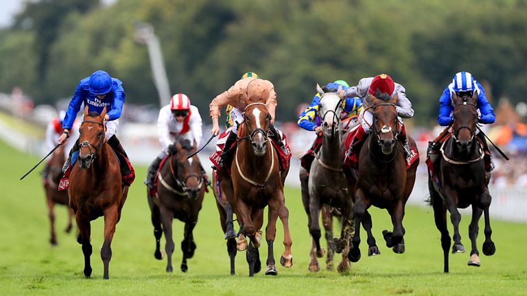 Dal Harraild ridden by jockey Pat Cosgrave (second left) burst through to win