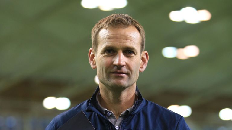 Dan Ashworth, FA Director of Elite Development, holds the 'England DNA' brochure at the FA media briefing at St. Georges Park, Burton-upon-Trent