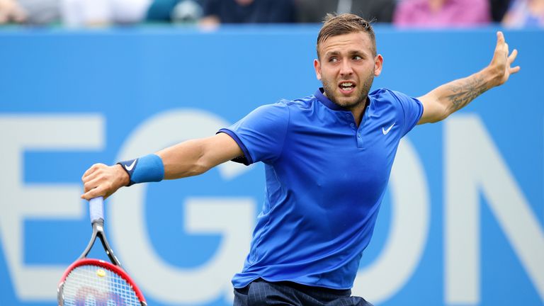  Daniel Evans of Great Britain plays a backhand