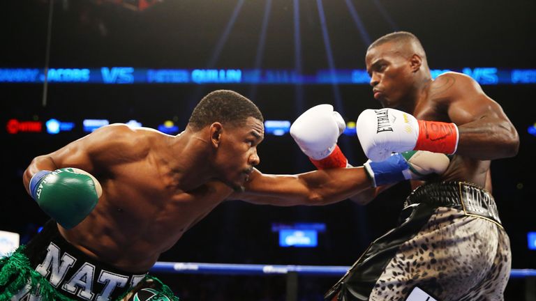 NEW YORK, NY - DECEMBER 05:  Danny Jacobs (L) punches Peter Quillin during their WBA Middleweight Championship bout on December 5, 2015 in the Brooklyn bor