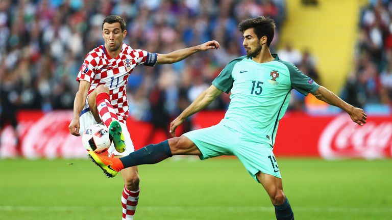Darijo Srna of Croatia and Andre Gomes of Portugal compete for the ball at Euro 2016