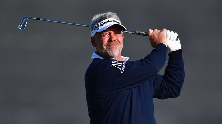 TROON, SCOTLAND - JULY 14:  Darren Clarke of Northern Ireland hits his ksecond shot on the 3rd during the first round on day one of the 145th Open Champion
