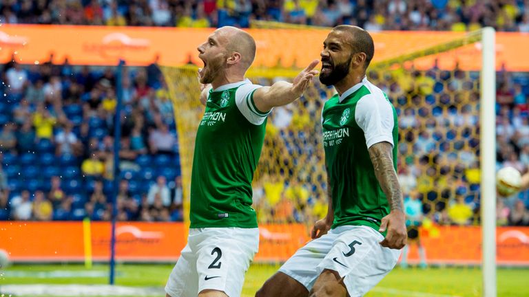 Hibernian's David Gray (left) with Liam Fontaine as he opens the scoring
