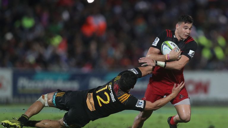 SUVA, FIJI - JULY 01: David Havili of the Crusaders is tackled by Anton Lienert Brown of the Chiefs during the round 15 Super Rugby match between the Chief