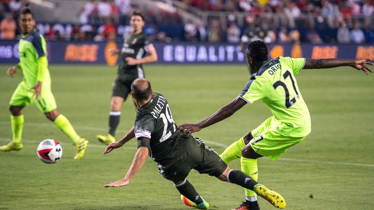 Divock Origi scores against AC Milan