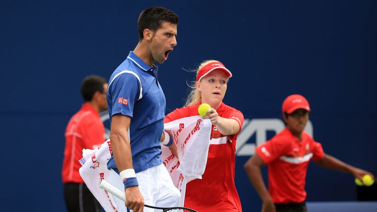 Novak Djokovic of Serbia celebrates winning the first set against Kei Nishikori of Japan in the Singles Final during Day 7 of the Ro