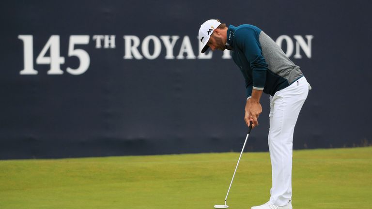 Dustin Johnson of the United States putts on the 18th green during the second round on day two of the 145th Open