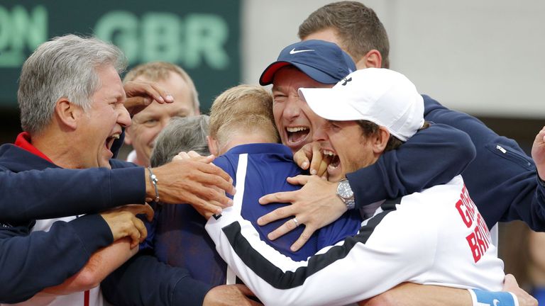 Edmund (middle) celebrates with Murray and other team-mates after beating Serbia during the Davis Cup World Group quarter-final