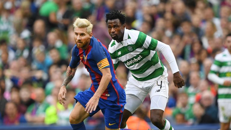 Lionel Messi (L) of Barcelona and Efe Ambrose (R) of Celtic during the International Champions Cup series match in Dublin