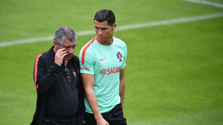 Portugal forward Cristiano Ronaldo talks to coach Fernando Santos