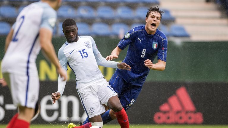 England's Fikayo Tomori fouls Italy's Andrea Favilli to concede a penalty 