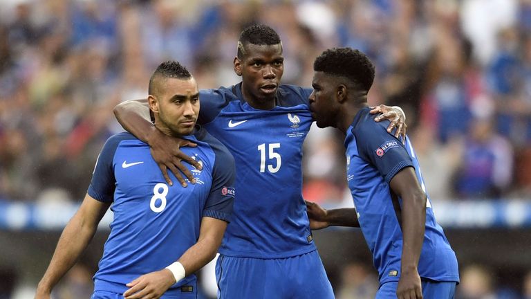 (LtoR) France's forward Dimitri Payet, France's midfielder Paul Pogba and France's defender Samuel Umtiti stand together for the Euro 2016 quarter-final fo