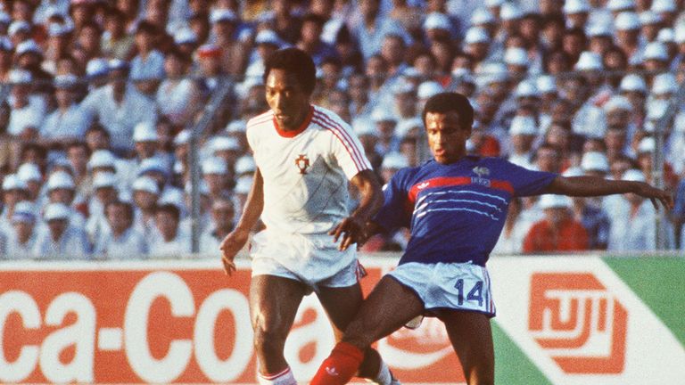French midfielder Jean Tigana (R) tries to kick the ball away