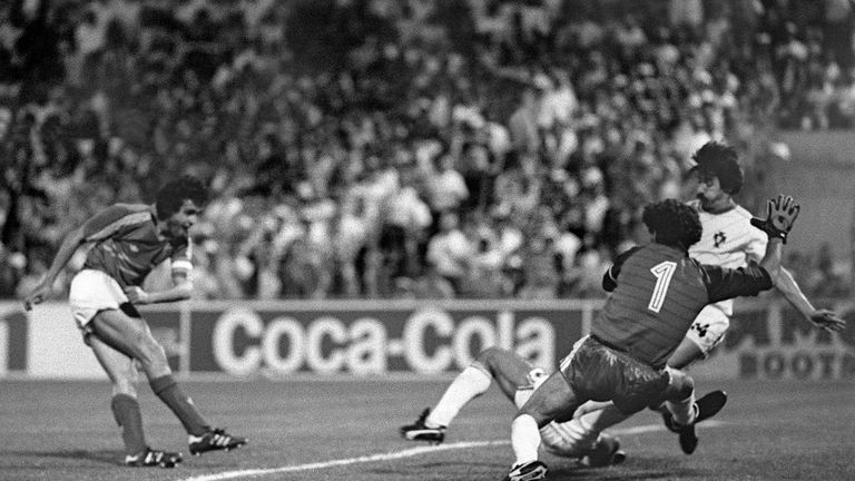 French captain and midfielder Michel Platini scores the winning goal in extra time against Portugal