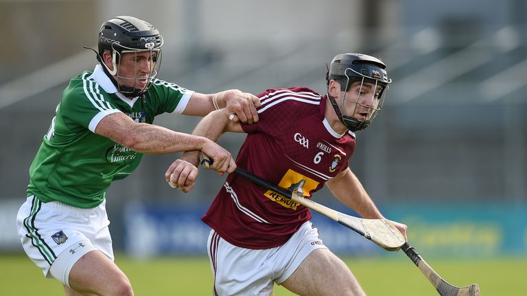 Aonghus Clarke is tackled by Darragh O'Donovan of Limerick