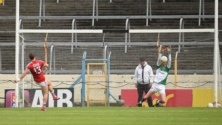 Colm O'Neill's penalty is saved by Limerick goalkeeper Donal O'Sullivan