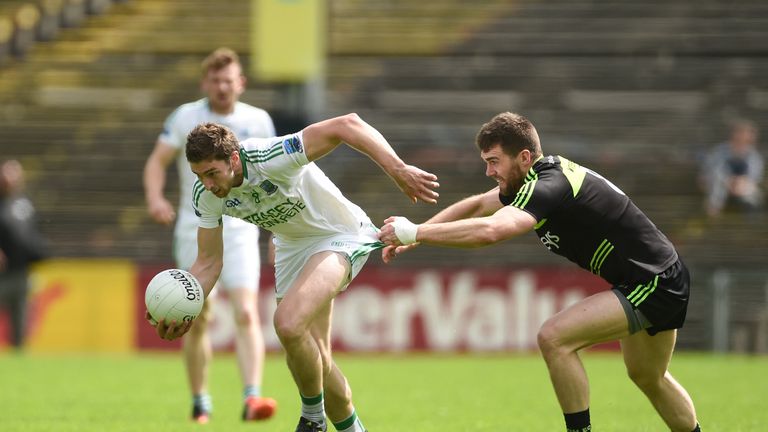 Mayo midfield Seamus O'Shea gets to grips with Eoin Donnelly