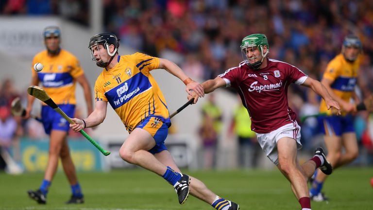 Tony Kelly of Clare in action against David Burke of Galway 