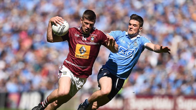 John Heslin of Westmeath attempts to get away from Dublin's Eric Lowdes