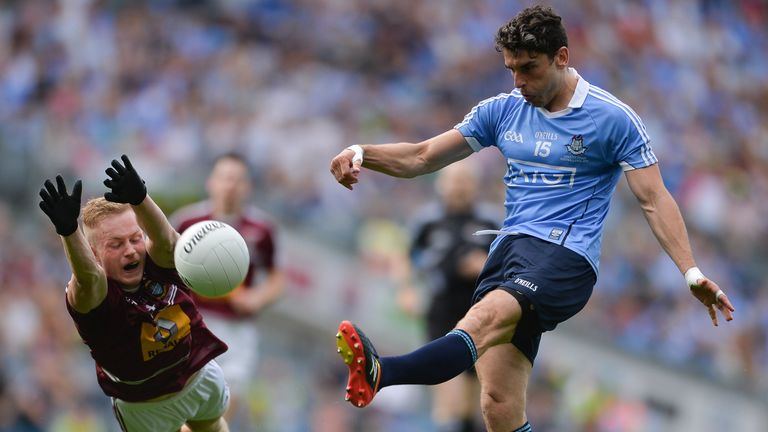 Killian Daly of Westmeath tries to block down Dublin's Bernard Brogan