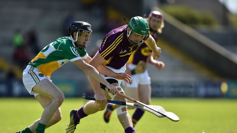 Matthew O'Hanlon competes for possession with Kevin Connolly of Offaly