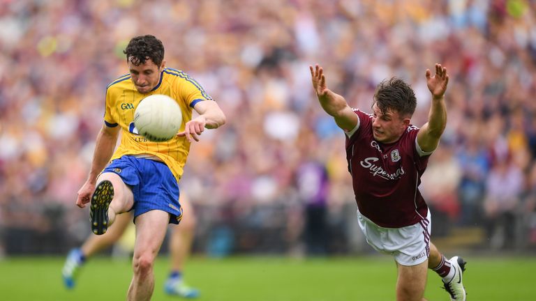 Ciaráin Murtagh of Roscommon in action against Eoghan Kerin of Galway
