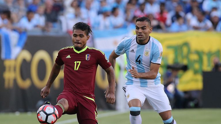 FOXBORO, MA - JUNE 18:  Gabriel Mercado #4 of Argentina chase Josef Martinez #17 of Venezuela in the first half during the 2016 Copa America Centenario qua
